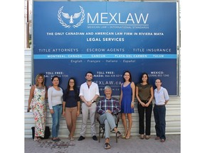 President and founder of MexLaw Charles Tibshirani, seated, with his team that includes Canadian lawyers who belong to the Canadian Bar Association and follow its code of ethics.