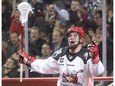 Jeff Shattler of the Calgary Roughnecks starts to cheer before realizing the ball didn't go in the net against Saskatchewan Rush Saturday January 2, 2015 at the Saddledome during their home opener.
