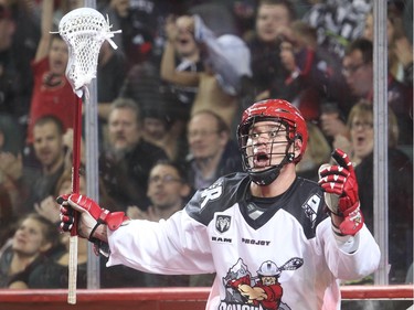 Jeff Shattler of the Calgary Roughnecks starts to cheer before realizing the ball didn't go in the net against Saskatchewan Rush Saturday January 2, 2015 at the Saddledome during their home opener.