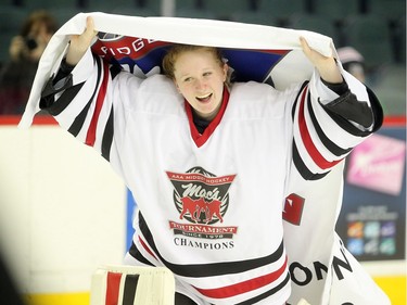 Northern Capitals goalie Kelsey Roberts skated with the championship flag after they beat the Rocky Mountain Raiders in the Mac's AAA Midget female final at the Scotiabank Saddledome on January 1, 2016. The Capitals defeated the Raiders 5-1 to take the 2015 title.