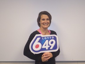 Shalee Stair and 16 of her gym buddies won $1 million in the LOTTO 6/49 Dec. 12 draw.