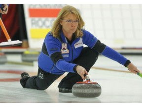 Skip Shannon Kleibrink makes a shot during her match against the Chelsea Carey rink in the 2016 Alberta Scotties Tournament of Hearts bonspiel at the North Hill Community Curling Club.