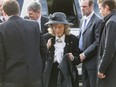 Marg Southern, wife of the late Ronald D. Southern, arrives with family for her husband's funeral at Spruce Meadows in Calgary, Alta., on Thursday, Jan. 28, 2016. Ron Southern, a prominent philanthropist and businessman, is best known for start the Spruce Meadows show jumping facility 40 years ago and building ATCO into an international business powerhouse. Lyle Aspinall/Postmedia Network