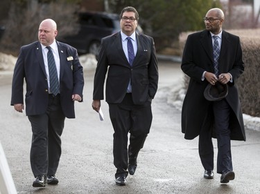 Mayor Naheed Nenshi (centre) walks with his Chief of Staff Chima Nkedirim (R) and Spruce Meadows staffer Dirk Delaney toward the funeral of Ronald D. Southern at Spruce Meadows in Calgary, Alta., on Thursday, Jan. 28, 2016. Ron Southern, a prominent philanthropist and businessman, is best known for start the Spruce Meadows show jumping facility 40 years ago and building ATCO into an international business powerhouse. Lyle Aspinall/Postmedia Network