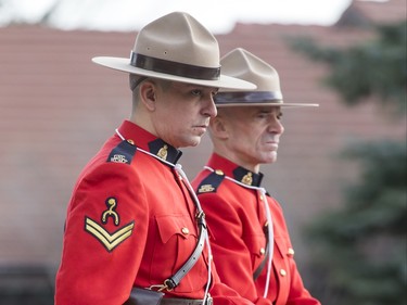 RCMP officers sit atop horses before the funeral of Ronald D. Southern at Spruce Meadows in Calgary, Alta., on Thursday, Jan. 28, 2016. Ron Southern, a prominent philanthropist and businessman, is best known for start the Spruce Meadows show jumping facility 40 years ago and building ATCO into an international business powerhouse. Lyle Aspinall/Postmedia Network