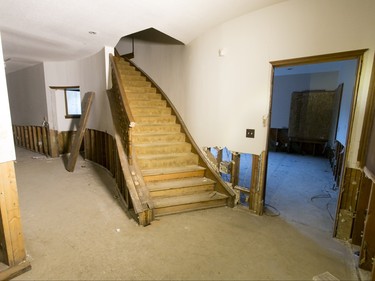 A flood-damaged home stands in the 1300 block of Riverdale Ave SW in Calgary, Alta., on Friday, Jan. 29, 2016. The province showed media around two of the 17 homes purchased by the government after the 2013 flood that are slated for demolition as a lead-up to a community discussion about what to do with the lots once they're vacant. Lyle Aspinall/Postmedia Network