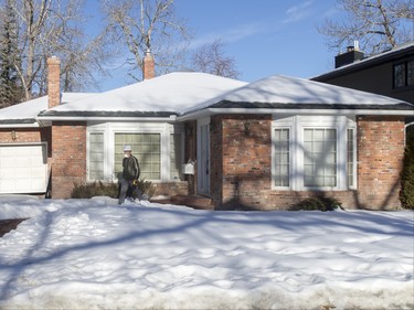 A flood-damaged home sits in the 1100 block of Riverdale Ave SW in Calgary, Alta., on Friday, Jan. 29, 2016. The province showed media around two of the 17 homes purchased by the government after the 2013 flood that are slated for demolition as a lead-up to a community discussion about what to do with the lots once they're vacant. Lyle Aspinall/Postmedia Network