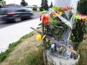 A memorial for Farida Abdurahman, pictured at the corner of Centre Street North and 43rd Avenue, where the pedestrian was killed while in a crosswalk on July 28, 2015.
