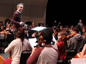 The Calgary Youth Orchestra (seen here in rehearsal) dresses up for a performance on Saturday night.