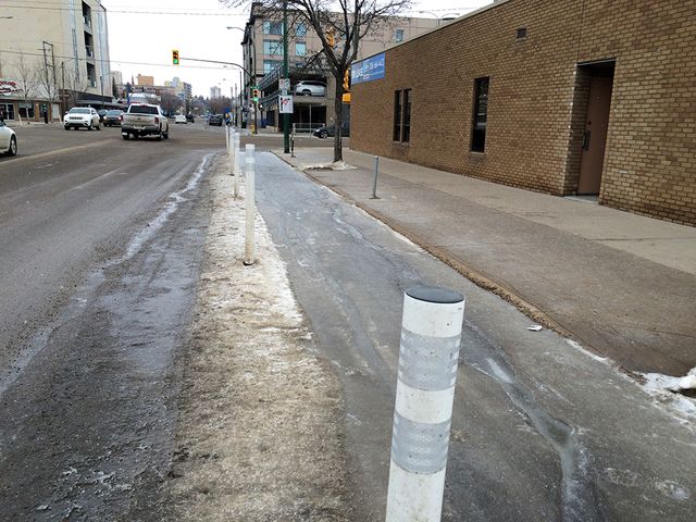 Drainage problems lead to ice buildup during a recent trip down Saskatoon's first separated bike lane.