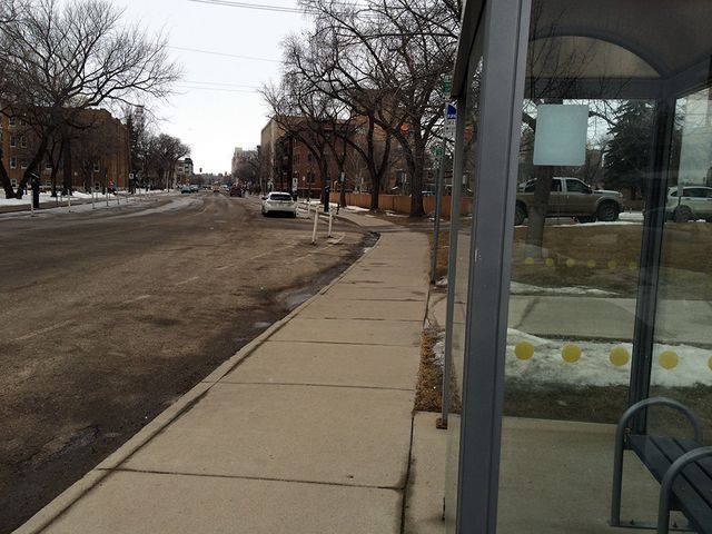 The bike lane is also interrupted by bus stops.