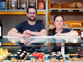 CALGARY, AB -- February 16, 2016 -- Erik Burley and Leah Gamache pose in front of a selection of pastries at Al Forno in Calgary on Tuesday, Feb. 16, 2016.
