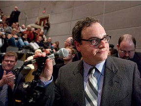 Ezra Levant turns after addressing a partially filled auditorium at a canceled event at the University of Ottawa on March 23, 2010. The Alberta government is battling an online news outlet founded by the former Sun News pundit over access to the legislature and has asked a recently retired journalist to review its media policy. THE CANADIAN PRESS/Pawel Dwulit