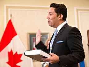 Alberta Minister of Culture and Tourism Ricardo Miranda is sworn in as a new cabinet minister in Edmonton on Feb. 2, 2016.