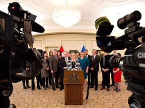 Alberta Premier Rachel Notley speaks to media after the swearing in of new cabinet ministers in Edmonton on Monday, Feb. 2.