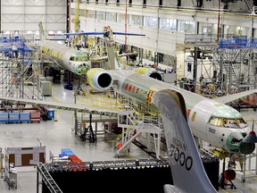 People tour the Bombardier Global 7000 aircraft and facility in Toronto on Tuesday, November 3, 2015. THE CANADIAN PRESS/Nathan Denette