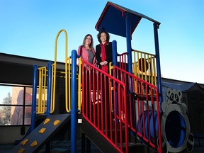 Brenda Strafford Society for the Prevention of Domestic Violence Executive Director Eileen Bell, right and Sandy Scobie a counsellor with the society, were photographed in the secure playground at the housing complex the group runs in Calgary.  The Brenda Strafford Society is celebrating its 20th anniversary this year.