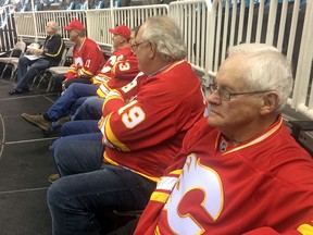 Jim Brodie, grandfather of Flames' defenceman TJ, takes in a practice along with a number of other dads at Flames Dads Trip.