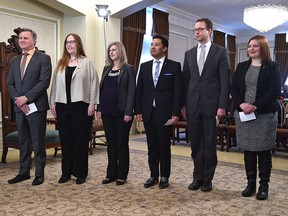 New ministers waiting to be sworn in, from left, Richard Feehan, minister of indigenous relations, Christina Gray, minister of labour and minister responsible for democratic renewal, Stephanie McLean, minister of Service Alberta and minister of the status of women, Ricardo Miranda, minister of culture and tourism, Marlin Schmidt, minister of advanced education and Brandy Payne, associate minister of health.