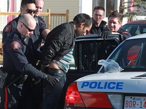 District 5 police officers arrest one of three suspects in a break and enter in Taradale on Monday morning. The three broke into a home on Taradale Pl when someone was in the house. The resident called police and the three were arrested while trying to flee the area.