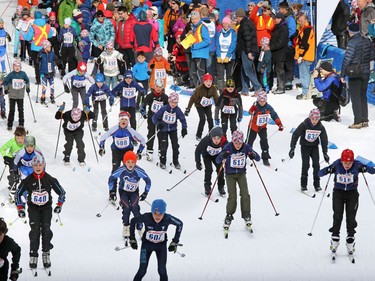 Racers in the Kananaskis Ski Marathon (a.k.a. the Cookie Race) take off from the start for the 3 km event in the 39th annual loppet in Peter Lougheed Provincial Park on Saturday February 27, 2016.
