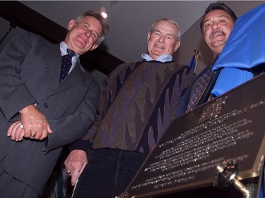 October 2, 2002: Then Premier Ralph Klein, former Premier Don Getty, and M.L.A. Gene Zwozdeskey stand beside a plaque that was just unveiled to celebrate the official dedication of the Don Getty Wildland Provincial Park, near Bragg Creek.