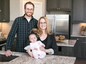 Andrew and Shashana Walker, with baby Emma, bought a zero lot line home in Nolan Hill.