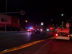 Police close Centre Street North after a pedestrian was hit crossing the thoroughfare on the evening of Monday, Feb. 8, 2016. The woman did not survive.