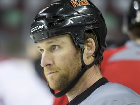 Calgary Flames defence man Dennis Wideman skates during a practice in Calgary, Alta., on Thursday, Feb. 4, 2016. It was his first time skating with the team since being handed a 20-game suspension for cross-checking linesman Don Henderson.