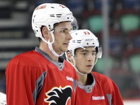 Calgary Flames Sean Monahan, left, and Johnny Gaudreau during practice at the Scotiabank Saddledome in Calgary on Wednesday February 10, 2016. Leah Hennel/Postmedia