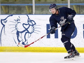 Mount Royal Cougars forward Cam Maclise practises with the team at the Flames Community Arenas on Thursday, Feb. 18, 2016. (Gavin Young/Postmedia)