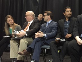 An all-candidates forum in Chestermere in April 2015. On the right is Jamie Lall.