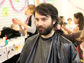 Swerve's Going Out Editor Jon Roe gets a haircut at Haircuts by Children at the High Performance Rodeo.