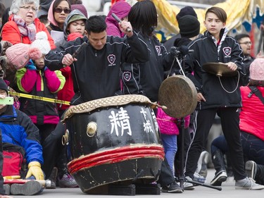 A drummer performs during the Dragon Dance during a Chinese New Year celebration outside of the Chinese Cultural Centre in downtown Calgary, Alta., on Sunday, Feb. 7, 2016. The Chinese community is celebrating the Year of the Monkey. Lyle Aspinall/Postmedia Network