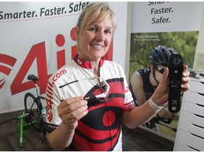 Victoria Brilz, chief business development officer at 4iiii Innovations in Cochrane, holds the company's Precision Power Meter and Sportiii.