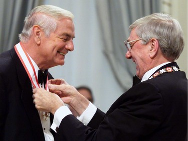 April 14, 1999: Former Alberta Premier Don Getty is promoted to officer into the Order of Canada by Governor General Romeo LeBlanc in Ottawa on April 14, 1999.