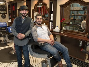 Essa Ashour, left, with brother MJ, owner of London Barbers at their location in Eighth Avenue Place East in Calgary,