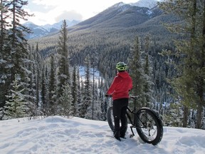 Fat biking guide Lenora Carbonetto admires the view. Fat biking at Sundance Lodge. Credit: Andrew Penner