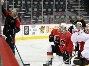 Calgary Flames head coach Bob Hartley  during practice at the Scotiabank Saddledome in Calgary, Alta. on Wednesday February 10, 2016. Leah Hennel/Postmedia