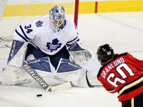 Flames forward Markus Granlund, scores on a breakaway against Maple leafs goalie James Reimer during first period at the Scotiabank Saddledome  on Tuesday.