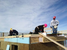 Construction underway on a triplex in Ravenswood for Habitat for Humanity Southern Alberta.