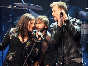 Hillary Scott, from left, Dave Haywood and Charles Kelley of the country pop music group Lady Antebellum will be headed to Calgary to perform July 15 at the Saddledome as part of the Virgin Mobile Stampede Concert Series.