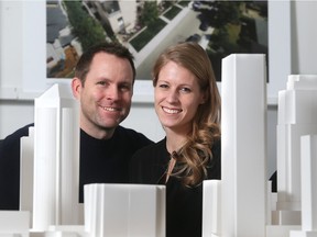 Laura and Jesse Hindle, principals at Hindle Architects, with a model of the west end of downtown Calgary in front of them at their Currie Barracks offices on Thursday Feb. 4, 2016.