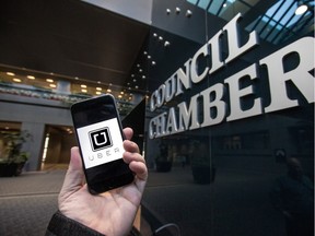 The Uber app is pictured outside Calgary City Hall.