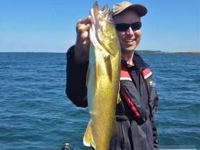 Jim Hoey with a Lake Newell walleye