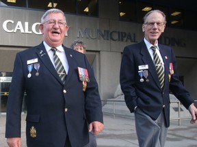 Kensington Royal Canadian Legion president  Bill Cox, left, and vice-president Al Seddon are all smiles leaving Calgary City Council Monday February 8, 2016 after council unanimously approved the redevelopment of the Kensington Road site.