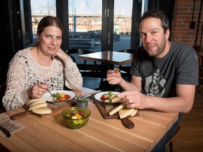 Michal Lavi, left, and Aviv Fried of Sidewalk Citizen in the Simmons Building in the East Village lunch on shakshuka.