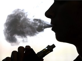 The city's seven-month-old bylaw essentially adds e-cigarettes to the existing smoking regulations, thus drawing an equivalence between smoking tobacco and vaping liquid containing nicotine, writes Rob Breakenridge.