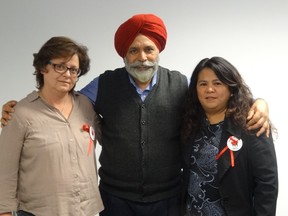 Sheri Arsenault, left, and Grace Pesa, right, meet with Calgary Skyview MP Darshan Kang to discuss support for Bill C-73.