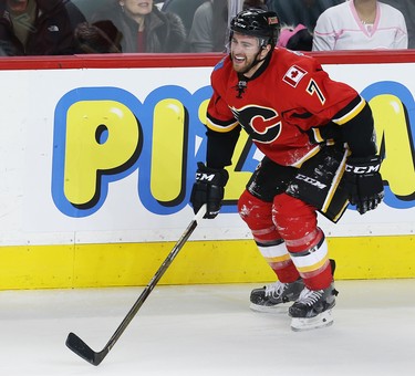 Calgary Flames TJ Brodie after blocking a shot against the Carolina Hurricanes during NHL hockey in Calgary, Alta., on Wednesday, February 3, 2016. Al Charest/Postmedia